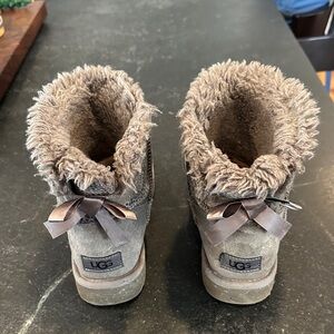 Bailey bow size 7 women gray UGG boots with cheetah pattern gently worn